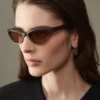 Les lunettes de soleil Curvo Lunettes de soleil ovales œil-de-chat Les lunettes de soleil Curvo Lunettes de soleil ovales œil-de-chat