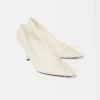 Les talons Tourni Talons pompes torsadés