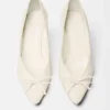 Les talons Tourni Talons pompes torsadés