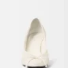 Les talons Tourni Talons pompes torsadés