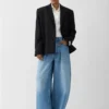 Pantalon en denim Ovalo de Nîmes Jean taille haute à coupe incurvée