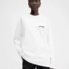 T-shirt à manches longues avec adresse imprimée T-shirt à manches longues avec adresse et logo imprimés – vendu exclusivement en ligne et dans notre boutique de Courchevel